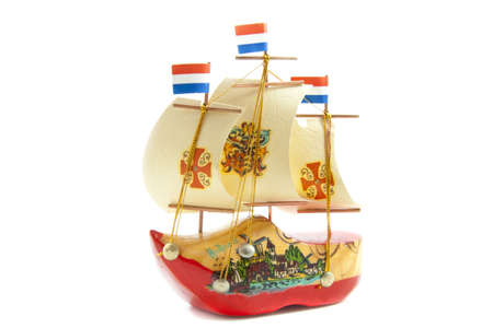 Hand painted boat of wood isolated over whiteの写真素材