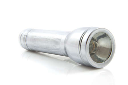 Old flashlight isolated on a white backgroundの写真素材