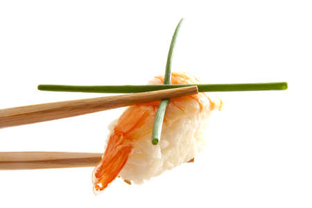 Japanese sushi between sticks isolated over whiteの写真素材