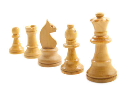 White chess pieces in a row isolated 