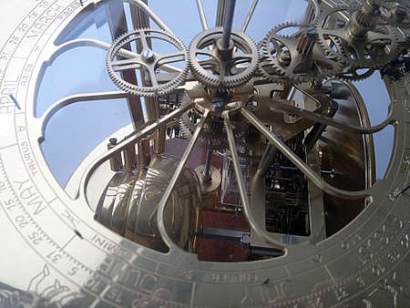 Vintage old clock mechanism with month scale