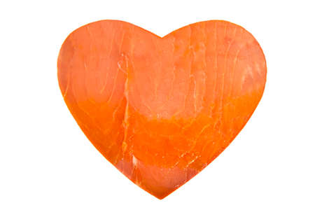 Heart of smoked pink salmon isolated over whiteの写真素材