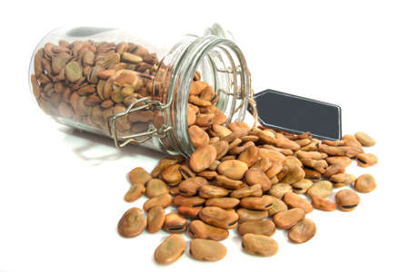 Beans in glass jar isolated over white