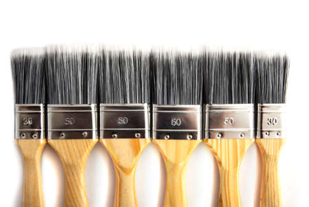 Paint brushes in a row for background use