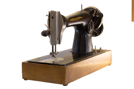 sewing machine with handle on white background