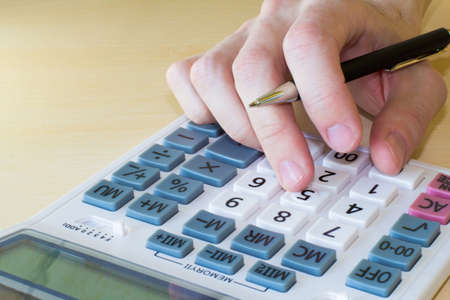financial and mathematical calculations on a calculatorの写真素材