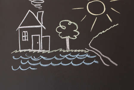 drawing with crayons on the boardの写真素材