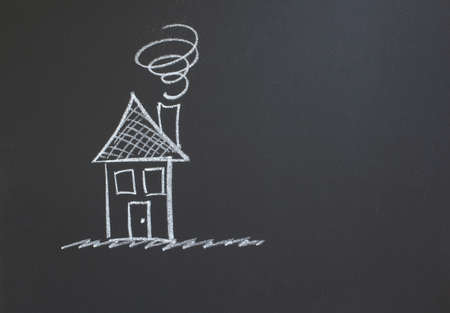 image of a house with chalk on a blackboardの写真素材