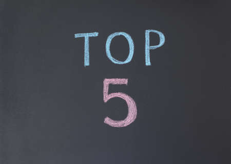 drawing with chalk on a blackboardの写真素材