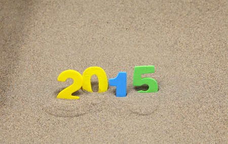 the figures laid out on the sandの写真素材