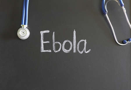 stethoscope and an inscription in chalk on the blackboardの写真素材