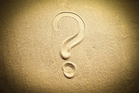 symbol question mark on the sandの写真素材