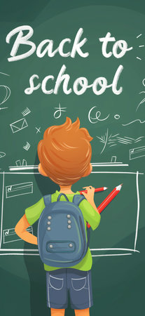 Kid writing Back to school on the blackboard. Back to schoolの写真素材