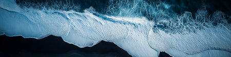 Stunning aerial perspective of ocean waves with white foam crashing on the black sand beach,...