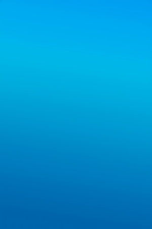 Minimalist gradient. Abstract light blue foil background. Smooth banner or wallpaperの写真素材