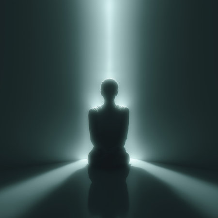 Female silhouette standing in a beam of light, symbolizing hope and new beginnings. Silhouette of woman in light ray leaving darknessの写真素材