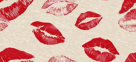 Red lipstick kiss marks covering a cream textured paper surface, creating a playful pattern. Red...