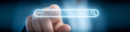 Finger pointing directly at a glowing search bar, interacting with a virtual data interface. Finger...