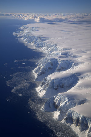 Frozen Antarctic landscape with towering, snow-covered mountains, glaciers, and sea ice. Antarctic...