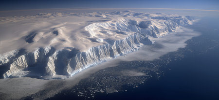 Frozen Antarctic landscape with towering, snow-covered mountains, glaciers, and sea ice. Antarctic frozen landscape showing vast ice and towering mountainsの写真素材
