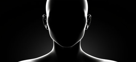 Human head silhouette with bright outline against a dark background representing identity and...