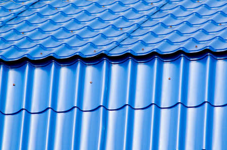 Blue metal on the roofの写真素材