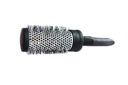 Metallic black comb on a white background isolatedの写真素材