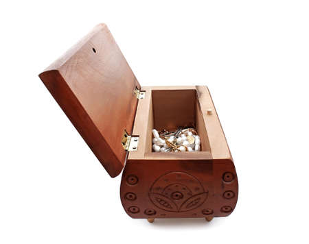 An open casket for jewelry made of wood with pearl and goldの写真素材