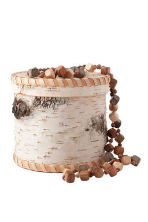 The casket of birch bark and wooden beadsの写真素材