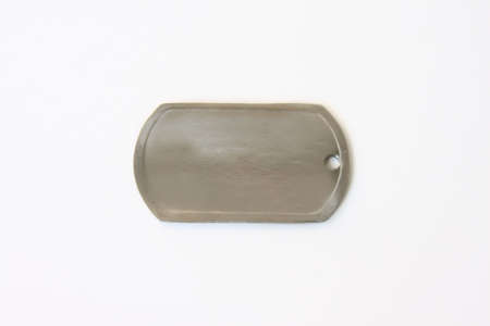 Dog tag on a white background  の写真素材