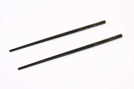 Chopsticks on  the white background  の写真素材