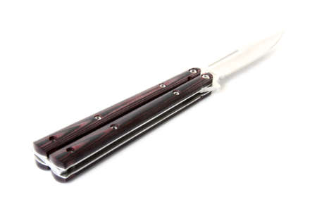 A butterfly knife isolated on whiteの写真素材