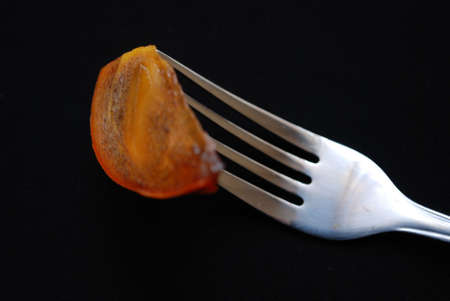 Fruit on forkの写真素材