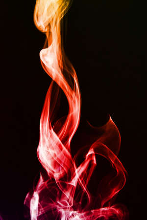 The abstract smoke on the dark backgroundの写真素材