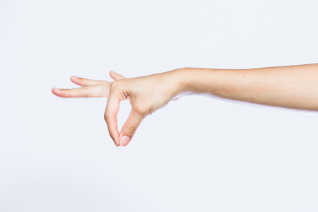 hand in signal of pinchの写真素材