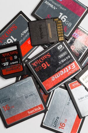 Chiangmai, Thailand - November 12, 2014: Pile of Used Sandisk Extreme Compact Flash cardsのeditorial素材