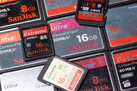 Chiangmai, Thailand - November 12, 2014: Pile of Used Sandisk Extreme Compact Flash cardsのeditorial素材