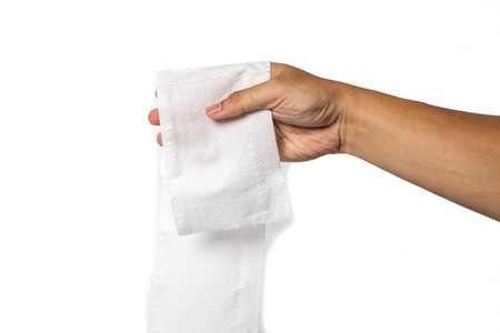 Hand holding toilet paper. isolated on whiteの写真素材