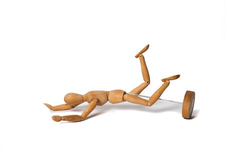 wooden Dummy run and fall on ground Isolated Over White Backgroundの写真素材