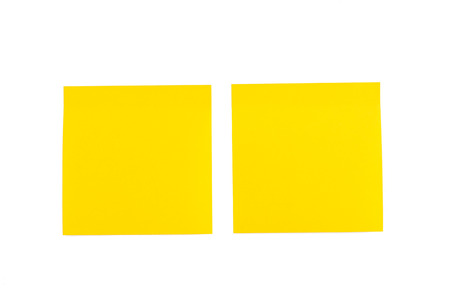 two yellow sticker on a white backgroundの写真素材