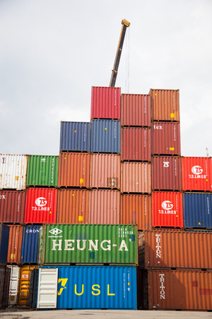 BANGKOK, THAILAND - SEPTEMBER, 16. A pile of containers and refrigerated containers at the Port of Bangkok taken at cloudy sunlight on September 16, 2014.のeditorial素材