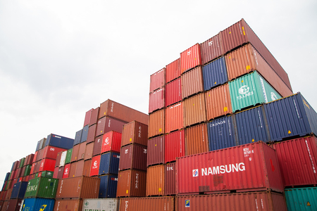BANGKOK, THAILAND - SEPTEMBER, 16. A pile of containers and refrigerated containers at the Port of Bangkok taken at cloudy sunlight on September 16, 2014.のeditorial素材