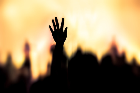 christian music concert with raised handの写真素材