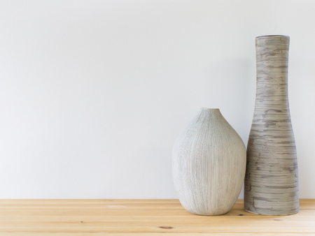 Detail shot of contemporary vases on the wooden shelf. Interior design.の写真素材