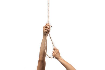 Hands holding rope slipknot isolated on white backgroundの写真素材
