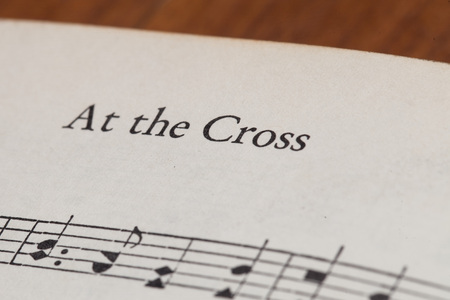 CHIANGMAI, THAILAND, April 21,2015. Singing The Christian Hymnal book on the song of " At the Cross " at home. April 21,2015のeditorial素材