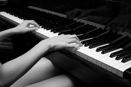 Playing pianoの写真素材