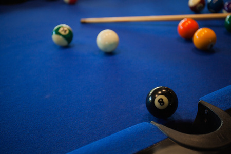 Billiard balls composition on blue pool tableの写真素材