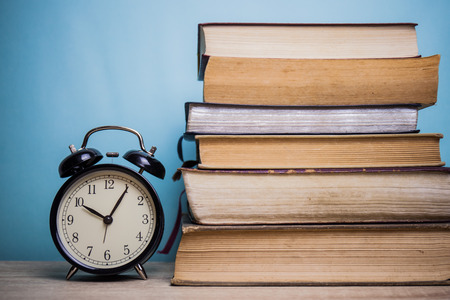 Alarm clock and book.の写真素材