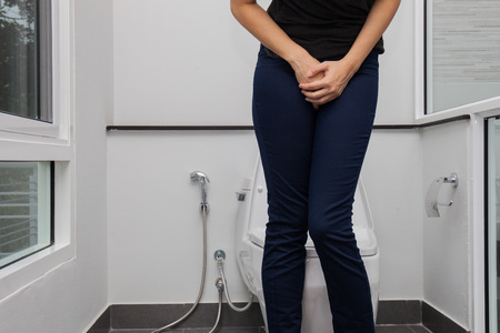 Woman in the toilet